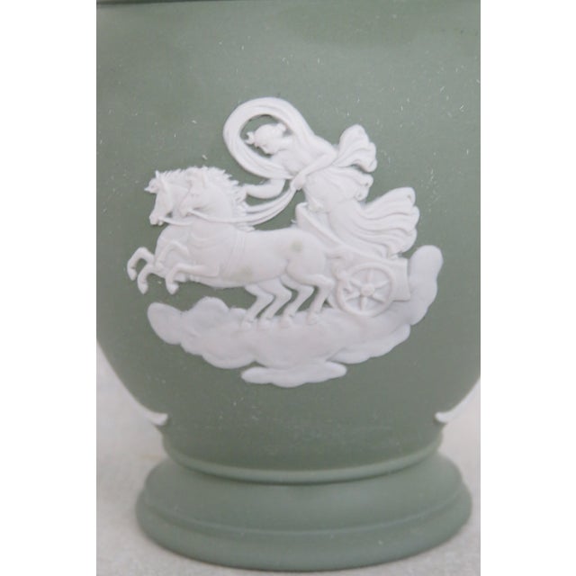 This charming Vase is made of Jasperware ceramic. It has a fabulous Green color with stunning cream cameo design of a...