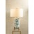 Imperial Dragon is our transitional lamp which features a crackled cream glaze background with teal colored dragon...