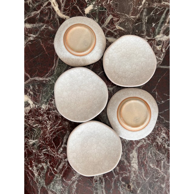 Beautiful ceramic place. Could be used as an appetizer or as a candle tray. Or just as a decorative piece. Purchase at an...