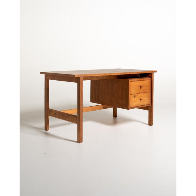 The "ge-125" desk, designed by hans j. Wegner for getama, was born from the danish designer's research into functional...