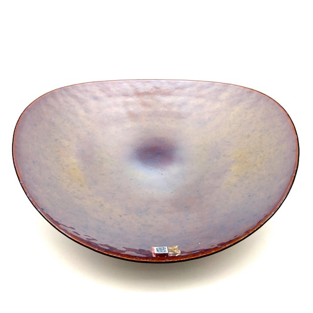 This warm-toned glass plate is entirely handmade by our glass artisans. The design and color make it a perfect piece to...