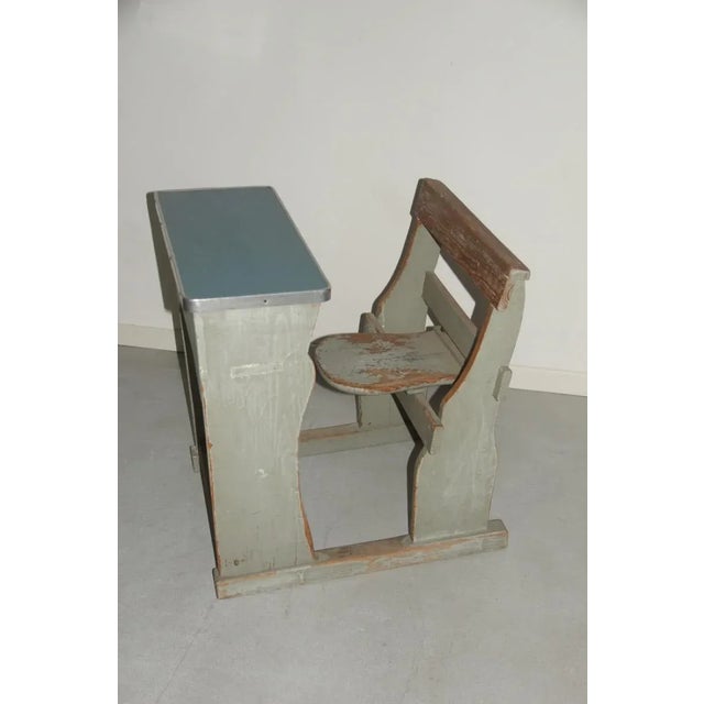 - Lacquered wood school bench from the 1950s - Openable seat - Laminate and aluminum top - Original condition