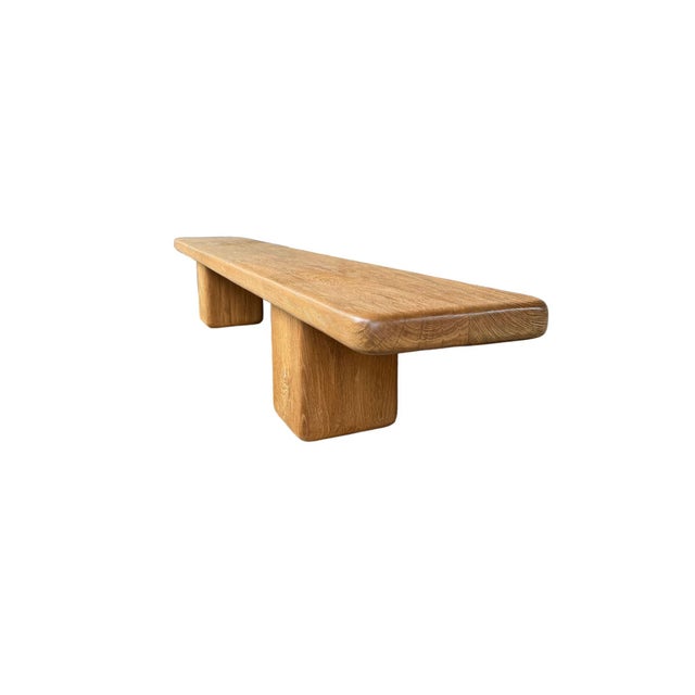 This very large teak wood bench is a striking expression of refined craftsmanship and timeless design. Defined by its...