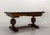 Spanish-style carved oak dining table, 1950s–1960s A Spanish-style oak dining table dating from the 1950s–1960s, featuring...