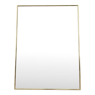 Hollywood Regency Thin Brass Frame Wall Mirror For Sale