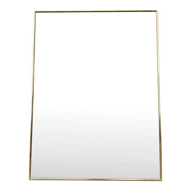 Hollywood Regency Thin Brass Frame Wall Mirror For Sale
