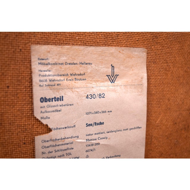 Ash Bookcase with Glass Sliding Door from VEB Deutsche Werkstätten Hellerau, 1970s For Sale - Image 6 of 7