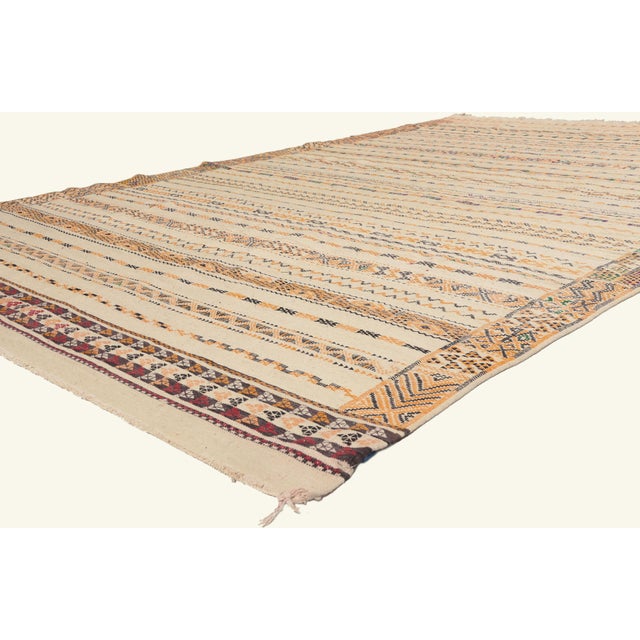 22114 Taznakht Moroccan Kilim Rug, 07'04 x 11'06. The Woven Legacy: A Taznakht Moroccan Masterpiece of Ancestral Harmony...