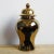 Vintage ceramic gold ginger/temple jar with lid. Perfect for display! Finished in a reflective metallic gold lacquer....