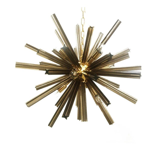 Contemporary smoked-fumè “quadriedro” Murano glass sputnik chandelier. Scenoghraphic and elegant chandelier. Metal frame...