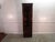 Item: Statton solid cherry corner bookcase. Age: 1980's. Details: Raised panel door and the Old Towne finish....