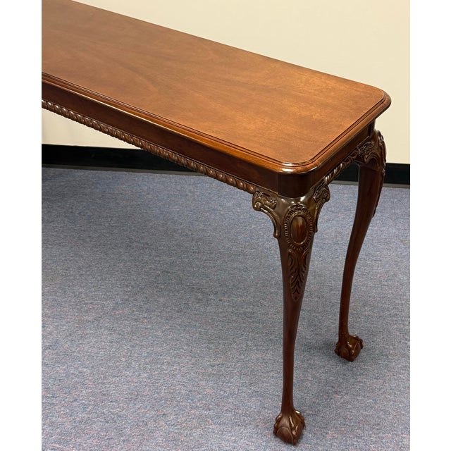 Gorgeous councill craftsman table features traditional 18th-century English design elements, ideal for use as a sofa table...