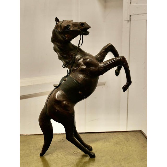 Arts and Crafts Leather Model of a Horse This is a rare and beautiful find, it was probably made for Liberty but the label...