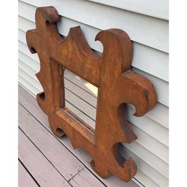 Folk Art industrial style mirror crafted from cut rusted metal sheets. Beautiful patinated in a copper color. Lightweight...