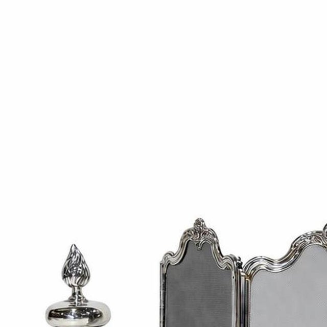Decoration - Fireplace front and utensils. 20th century Europe; in silver-plated metal. Dimensions: (Fireplace front) 100...