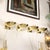 Paavo Tynell Set of Four Mid-Century Modernist Polished Brass Sconces by Paavo Tynell For Sale - Image 4 of 18