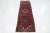 This beautiful vintage hand-knotted Heriz wool rug has a red field with a multicolor floral medallion motif. This rug...