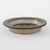 A ceramic bowl manufactured in the 1960s by the Danish manufacturer Søholm. It features natural colors of beige, brown,...