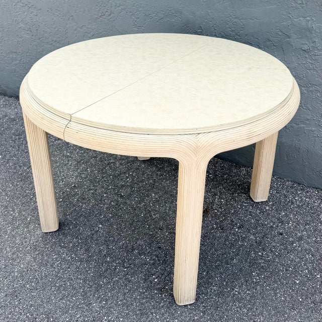 68” wide fully extended. A beautifully sculpted Boho Chic extendable dining table showcasing the organic craftsmanship and...