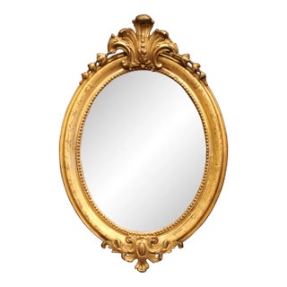 19th Century French Louis XV Oval Giltwood Mirror With Shell Decor For Sale