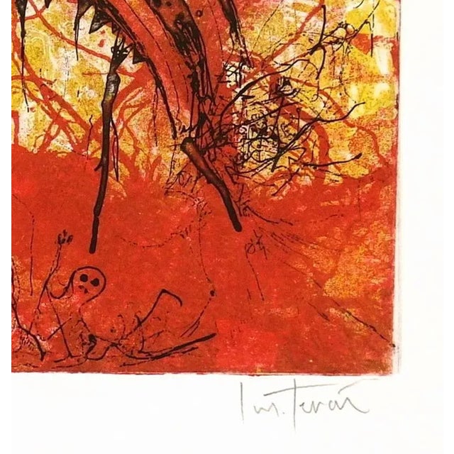 Imelda Teran, Fanciful aquatint etching of whimsical figures surrounding a tunnel backed by fiery hues of red and yellow...