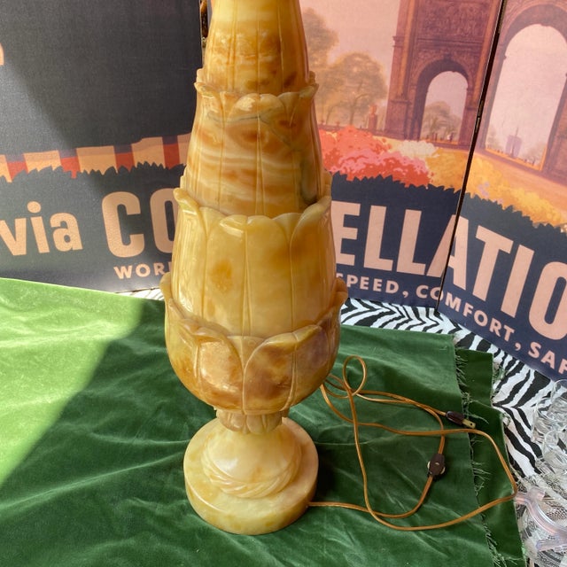 A beautiful orange stone large lamp. Handcarved floral details on the stone make this the perfect table lamp. Perfect for...