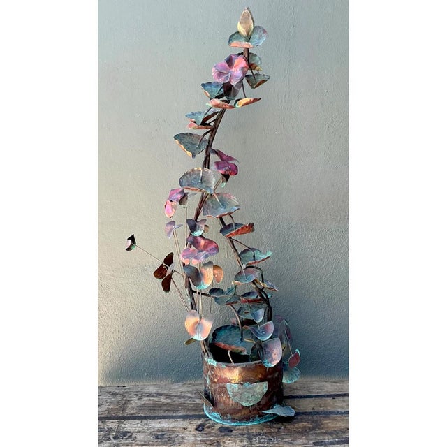 Standing at an impressive 54 inches tall, this vintage botanical floor sculpture is hand-crafted entirely of solid copper,...