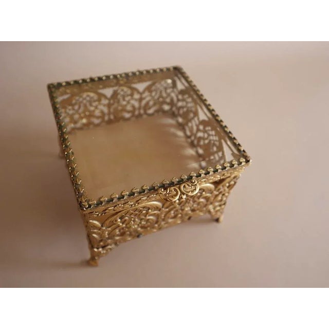 Charming vintage Hollywood Regency glass casket box. Classic square shape atop floret-base. Mole skin velvet lines...