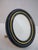 Vintage, 1980's Les Must de Cartier Paris oval picture frame. Gilt-plated metal base decorated with a blue enamel lacquer...