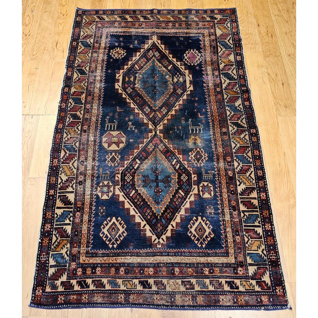 A superb example of 19th-century Caucasian weaving, this Caucasian Kazak area rug from the late 1800s beautifully...