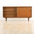 This vintage mid-century china cabinet was produced in England during the 1960s. Made from teak, this minimalist cabinet...