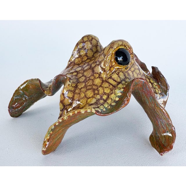 Vintage Artisan Undulating Ceramic Octopus Sculpture Offered for sale is an artisan-crafted ceramic octopus sculpture in...