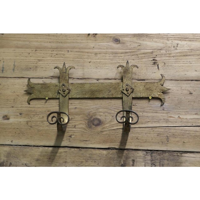 French Arts and Crafts Gothic Style Coat Hooks Hand Made in Iron with a gilt finish, the Coat Rack has 2 large curving...
