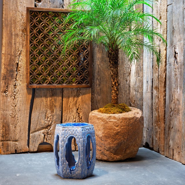 Sculptural and drenched in color, this ceramic garden table reinvents the barrel shape of classic Chinese drum stools....