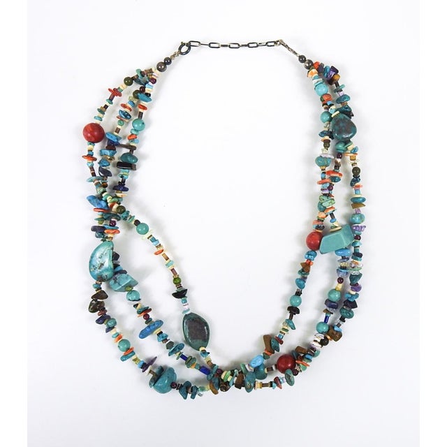 Late 20th century mostly turquoise with mixed hardstone beads three strand necklace. Larger turquoise nuggets are around...