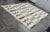 Design Plus Gallery presents a 8 ft 2 in × 9 ft 9 in Coulter Graphic Wool Area Rug from Four Hands. This area rug...