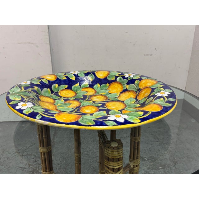 Design Plus Gallery presents an Italian Cottura Ceramic Wall Plate signed by M Zellini. This hand-painted plate showcases...