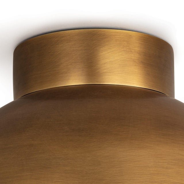 Our Montreux Flush Mount has a beautiful, minimalistic silhouette with its metal shade and large, the milk glass globe...