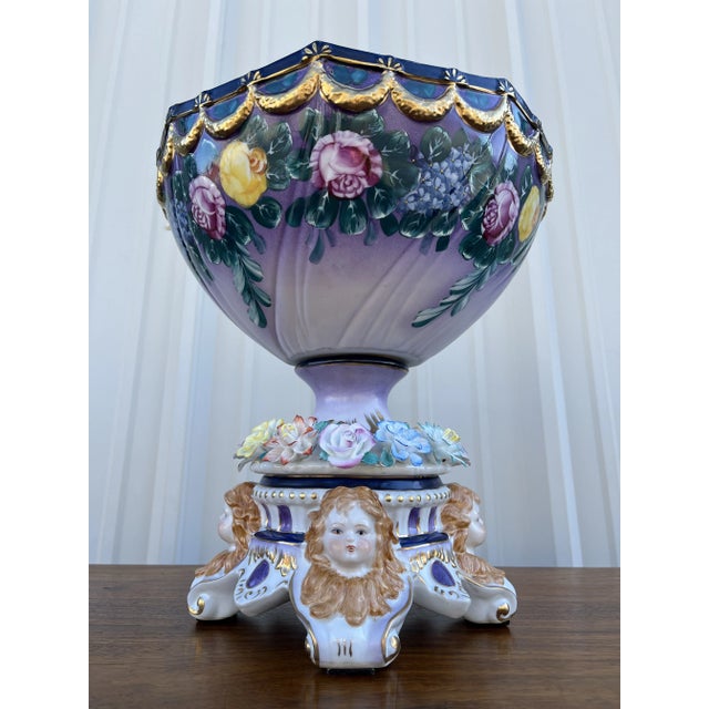 A beautiful porcelain footed epergne centerpiece bowl made by Dresden in Germany. This porcelain bowl is highly decorated...