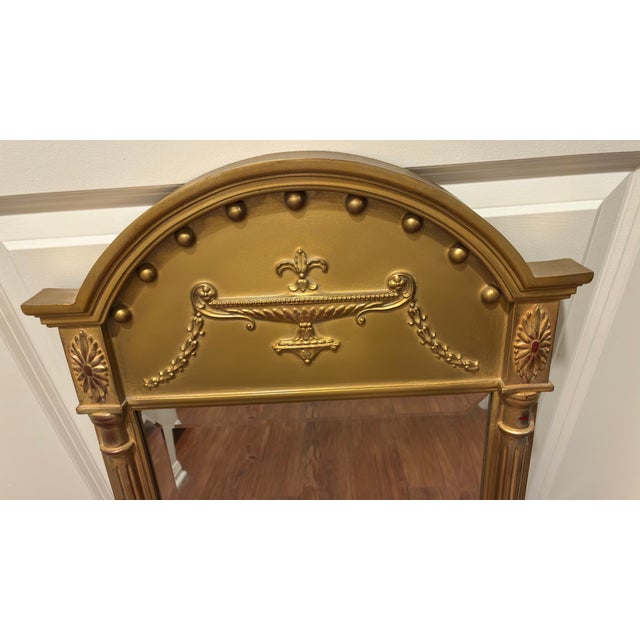 Regency style wall mirror, in gold finish. Males a perfect addition to any room or entry