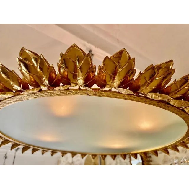 Large Spanish crown light in gilt metal and frosted glass, Spain, 1970s. Midcentury antique gilt iron frame or pendant...