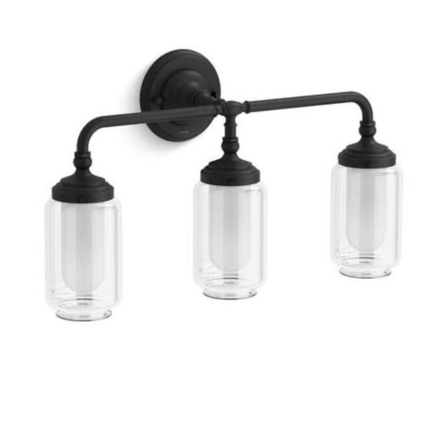 Classic, vintage-inspired Artifacts 3-light wall sconce/vanity light in matte black with clear glass bell shades and inner...