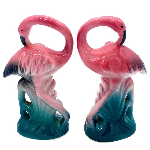 Mid-century pink and green ceramic flamingo tabletop salt & pepper shaker set by Five & Dime. The set features two...