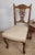 This nursing chair has many gorgeous carved features, truly highlighting the craftsmanship of the Edwardian era. The...