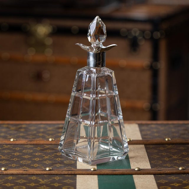 Antique 20th century english solid silver mounted cut glass decanter made by asprey of london. Formed of an elegant...