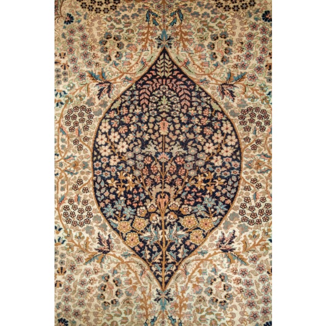Hand-knotted rug from the city of Tabriz. Quality wool on cotton warp. The rug has a beautiful pattern with a motif of the...