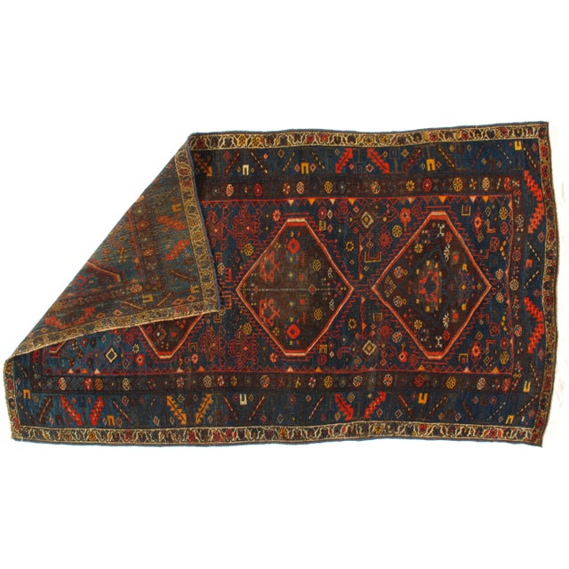 This is a fine antique Persian Bidjar that was made around 1880. The piece was handmade and hand-knotted from vegetable...