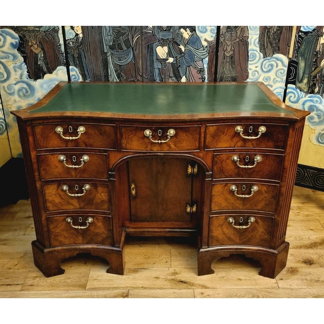 18th Century English Mahogany Serpentine Kneehole Desk, c. 1760. This desk is of the finest quality, made during the...