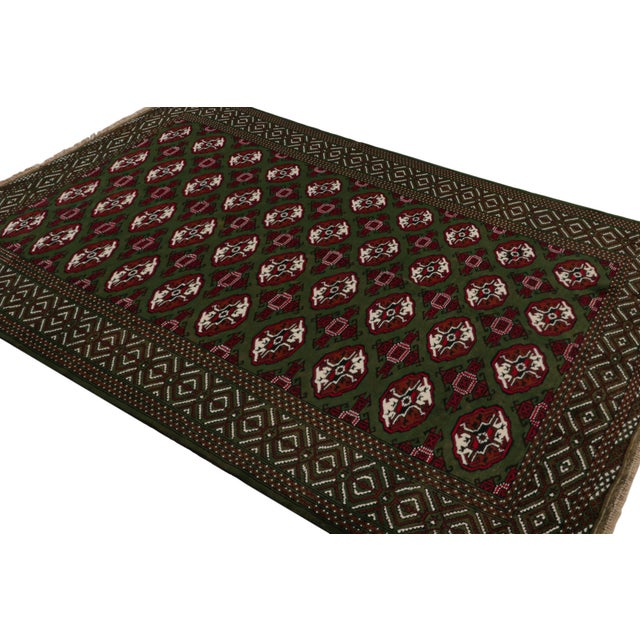 Hand knotted in wool, this 7x9 Baluch rug represents a new line of tribal carpets in the Modern Classics Collection by Rug...