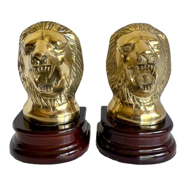 Vintage Brass and Rosewood Lion Bookends For Sale